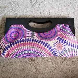 Wood handle purple clutch